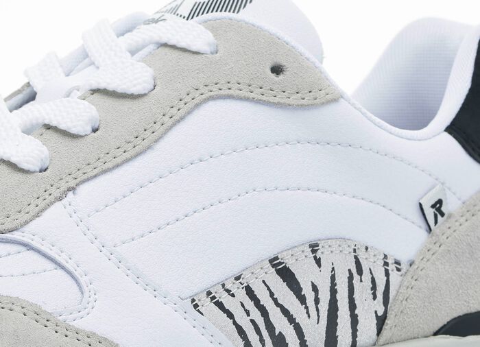 Rieker Sneaker mit interessantem Zebra-Druck 