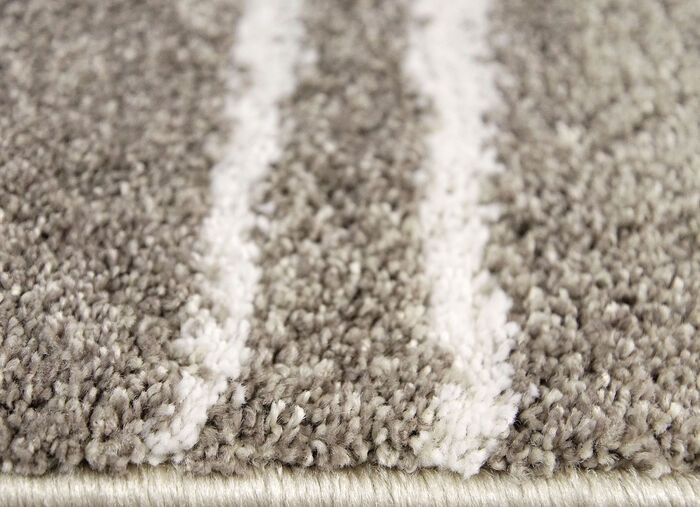 Brücken und Teppiche mit fein gearbeiteter Bordüre BEIGE