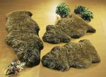 Bettumrandung aus echtem Lammfell in Tierform BRAUN