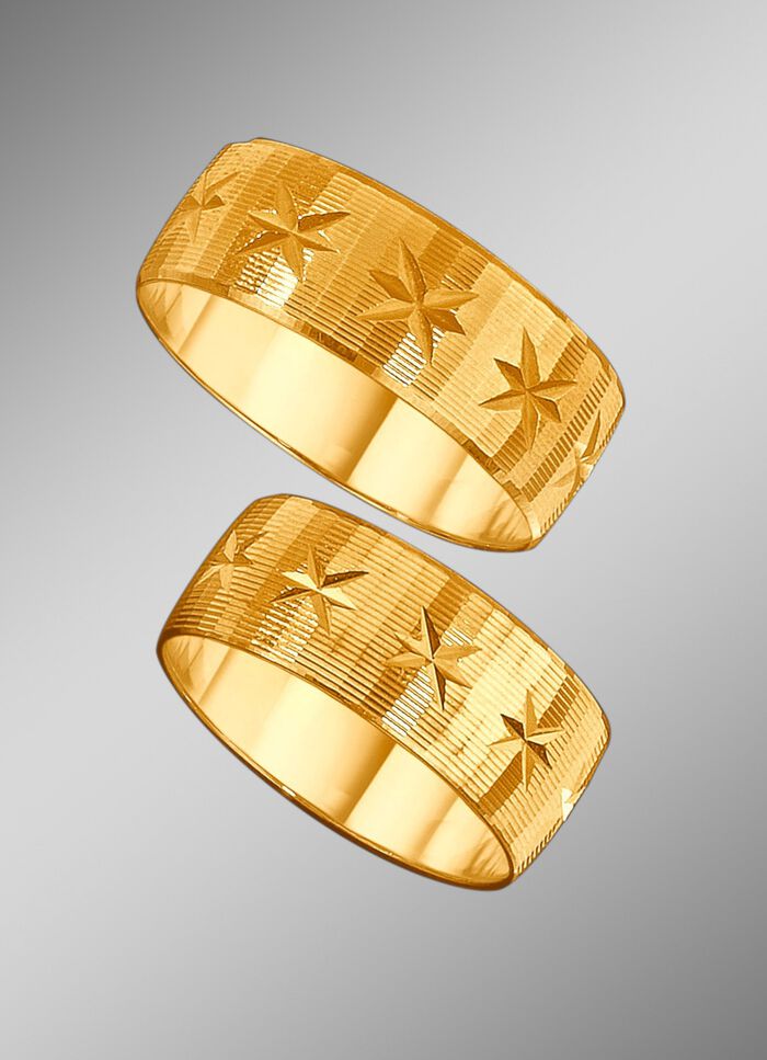 TraurinTrauring mit diamantierg mit diamantierten Rillen und kleinen Sternchen 