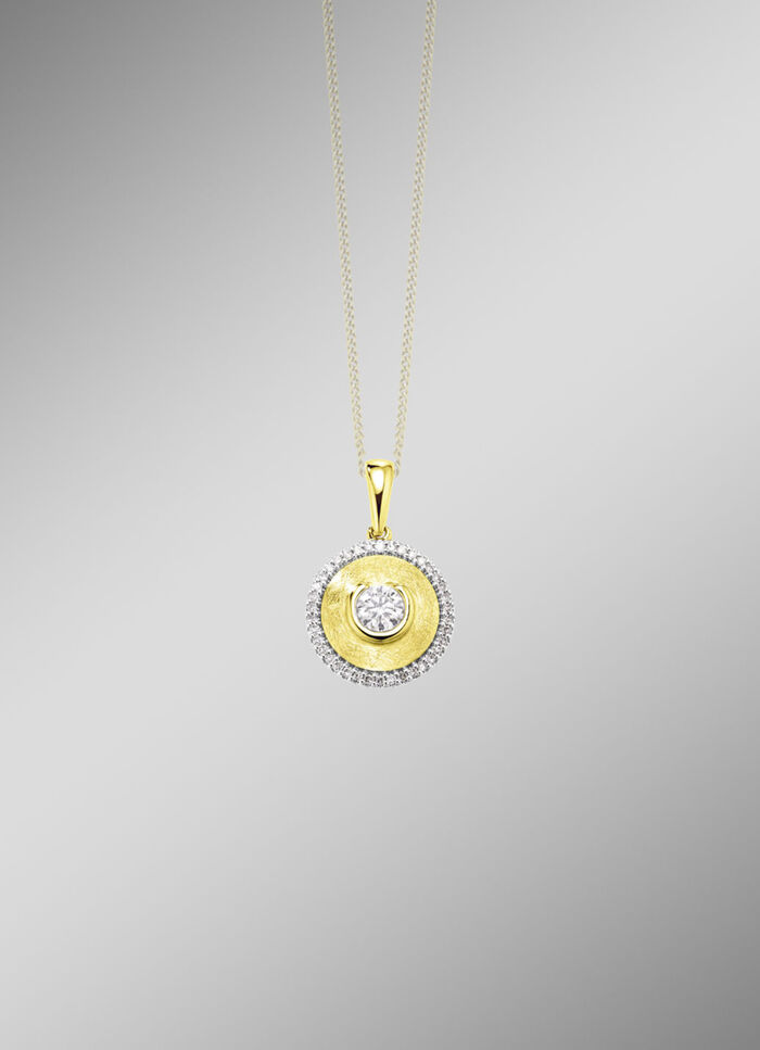 Stilvoller Anhänger mit Brillant und Diamanten 